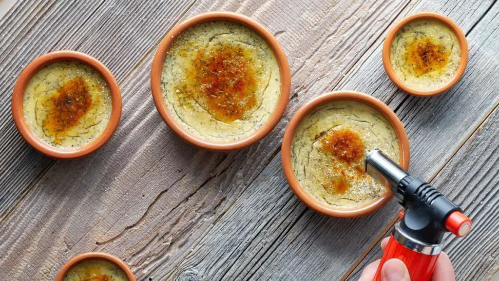 Delicious homemade Crème Brûlée with caramelized sugar topping